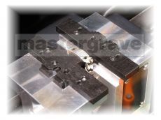 Jigs for holding jewellery while engraving
